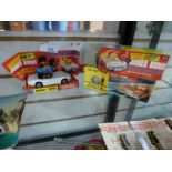 A James Bond Toyota 2000 and original box and a 'Man from Uncle' boxed car