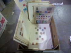 A box of mixed World stamps