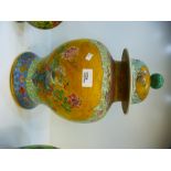 A Chinese pale blue and yellow ginger jar, having pair of panels decorated bird and foliage, 42 cms,