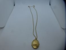 9ct yellow gold oval locket, marked 375, on a 9ct yellow gold neckchain, also marked 375, total