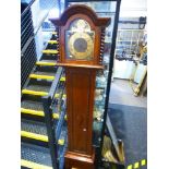 A 1930's oak shortcase clock