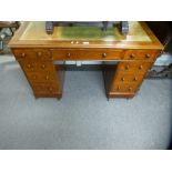 A Victorian mahogany twin pedestal desk, having nine drawers, 116 cms