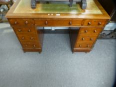 A Victorian mahogany twin pedestal desk, having nine drawers, 116 cms