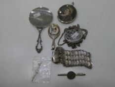 A silver and white metal lot comprising of a silver Guatemala 1895 coin bracelet, hand mirrors,