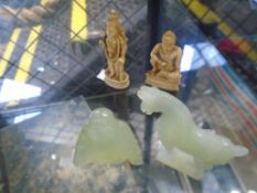 Two small Jade figures of Buddha and Tang horse and two small ivory figures