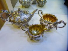 A very high quality silver heavy early Victorian tea service with decorative, ornate foliate design.