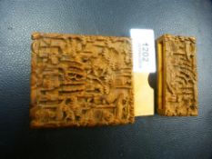 An old Burmese carved wooden card case, decorated figures