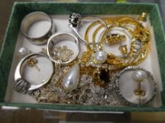 A small collection of silver rings, neckchains, etc