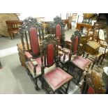 A set of eight early 20th century carved oak dining chairs to include a large pair of carvers