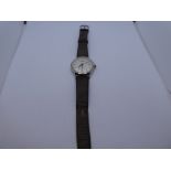 Vintage gent's stainless steel 'Longines' wristwatch on brown leather strap, with surface