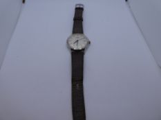 Vintage gent's stainless steel 'Longines' wristwatch on brown leather strap, with surface