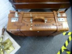 An old leather suitcase having an expanding lid, 66 cms