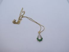 Modern 9ct yellow gold necklace, hung with pendant, inset with emerald and diamonds, marked 375, 3.