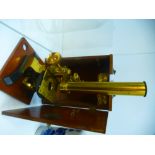 A Victorian brass microscope in fitted mahogany case