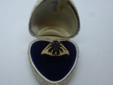 Gent's 9ct yellow gold signet ring, set with a garnet, size, weight approx 2.5g