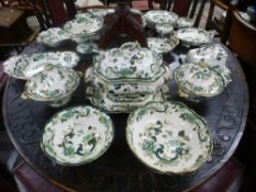 A large quantity of Mason's Chartreuse dinnerware to include a soup tureen, vegetable dished and