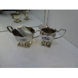 A lot comprising of a silver octagonal two handled trophy cup hallmarked Birmingham 1911 S W Smith