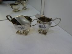 A lot comprising of a silver octagonal two handled trophy cup hallmarked Birmingham 1911 S W Smith