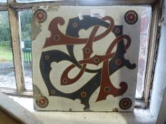 A large Minton gothic tile, 19th century, monogrammed WB, 30 cms