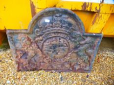 A large 19th century cast iron fireback decorated the Royal Coat of Arms crest, 97 cms