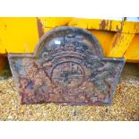 A large 19th century cast iron fireback decorated the Royal Coat of Arms crest, 97 cms