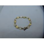 Pretty 9ct yellow gold bracelet of heart design with safety chain, total weight approx 4g