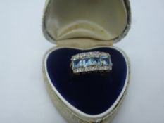 9ct yellow gold ring set with four square cut aquamarines, flanked with diamond chips, marked 375,