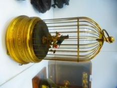 A 20th century automaton of bird in cage, with glass dome