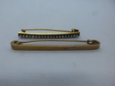 9ct yellow gold bar brooch, marked 9ct, together with an unmarked bar brooch, set with seed