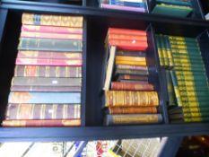 Three shelves of Antiquarian books and others, including eleven Punch volumes