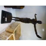 A reproduction bronze style figure of dancing Art Deco lady on square base