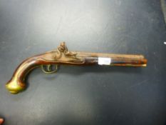 An early 19th century flintlock pistol with blanked off barrel