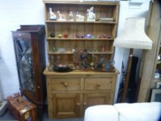 An old pine dresser and rackback having two drawers, 129 cms