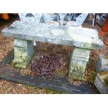 An old stone garden bench, made from door frame capitals and architrave, 134 cms