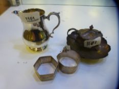 A silver lot comprising of napkin rings, milk jug, salt and trinket dish. Napkin rings, one