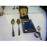 A silver lot comprising of silver gilt spoons, photoframe, napkin ring, spoon and cased baby's spoon