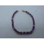 9ct yellow gold Amethyst link bracelet, with 25 faceted amethyst gross weight approx 10g
