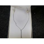 Contemporary cased silver necklace, the pendant hung with diamond chips, marked 925