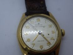 Vintage gents ROLEX 'OYSTER ELEGANTE' in 9ct yellow gold case and brown leather strap, not ticking