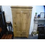 An old pine single door wardrobe with one drawer on turned feet, probably French, height 169 cms