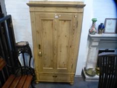 An old pine single door wardrobe with one drawer on turned feet, probably French, height 169 cms