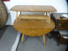 An Ercol elm two flap kitchen table and an Ercol oblong coffee table