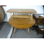 An Ercol elm two flap kitchen table and an Ercol oblong coffee table