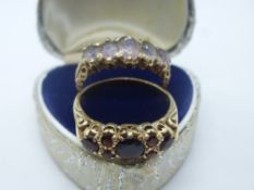 9ct yellow gold garnet set dress ring marked 375 and another, size T, weight approx 7.5g