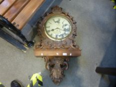 W. Hird; a Victorian carved oak wallclock having painted dial by W. Hird, Duke St, Barrow, height 92