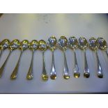 A set of twelve heavy silver spoons hallmarked Sheffield 1918 Adolph Scott. Gross weight approx 19.