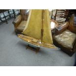 A 1930s marble head racing pond yacht, in original condition, length 129cms