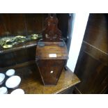An old mahogany candle box