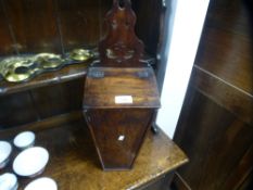 An old mahogany candle box