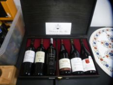 Six bottles of French red wine, various years, in presentation case